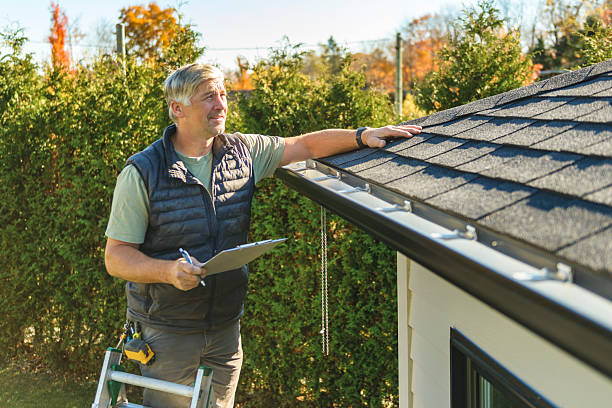 Professional Roof Replacement technician working in Ennis, MT